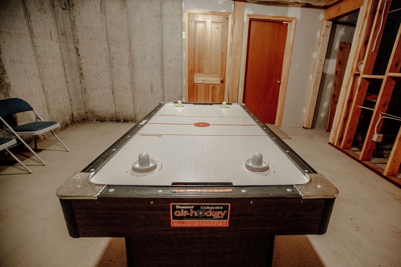 Summer use Air Hockey table in unheated basement 