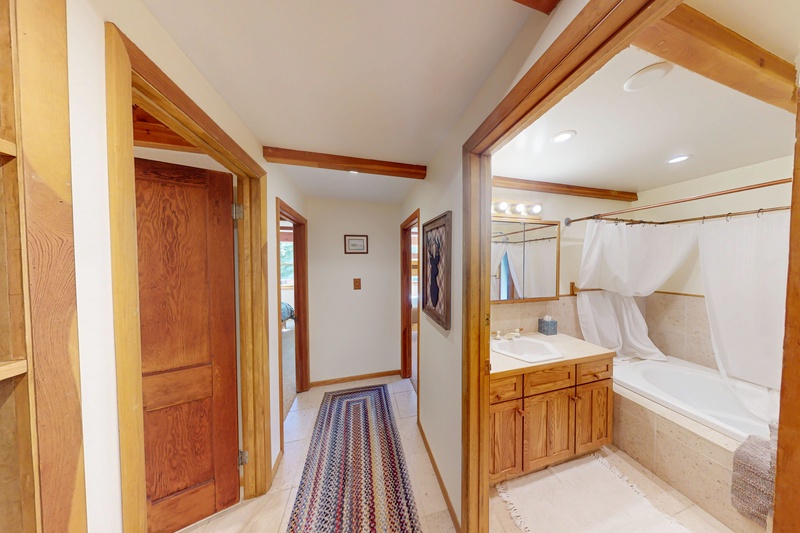 Downstairs Hall near Bathroom with Tub