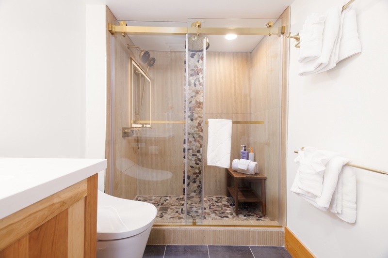 Unique river rock mosaic shower 