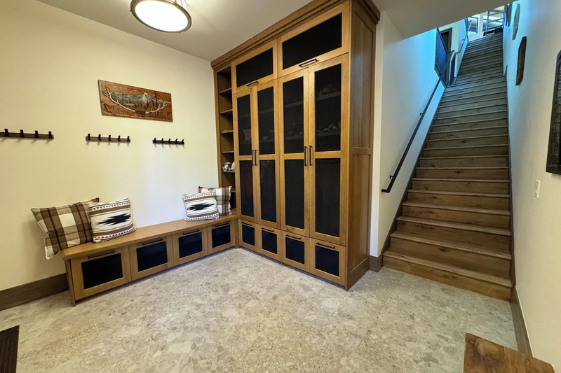 Mudroom with lockers and stairwell (2 flights to top)