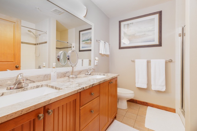 Double vanities in the primary bathroom offer plenty of space! 