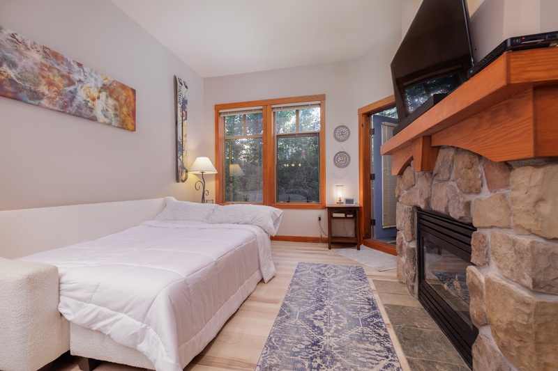 Full sized bed for additional sleeping space.