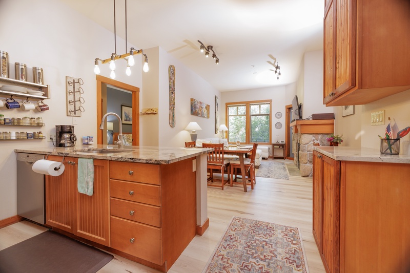 Bright, open layout connects the kitchen, dining and living area