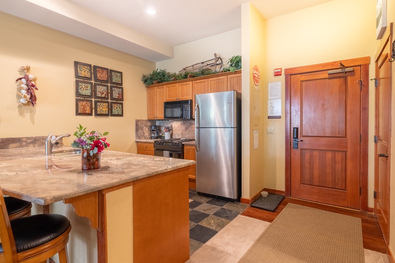 Spacious entry way and kitchen