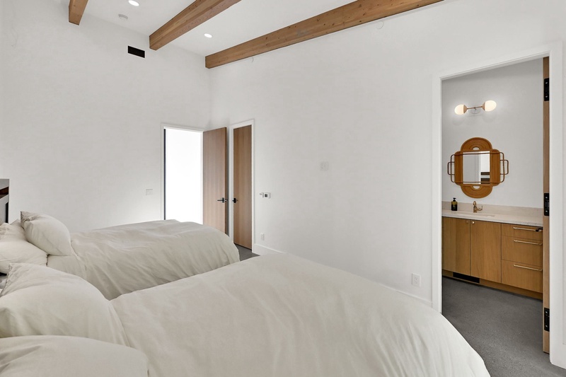 Main Floor Bedroom with Two Queen Beds