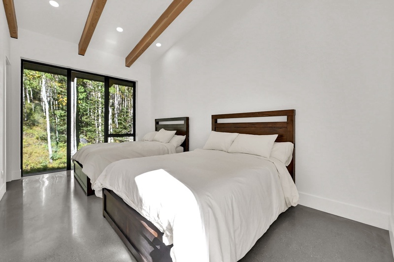 Main Floor Bedroom with Two Queen Beds
