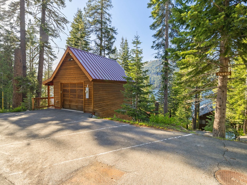 Parking is permitted in the garage, in front of the garage, and in one additional space