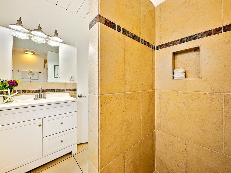 Shared bathroom with walk-in shower