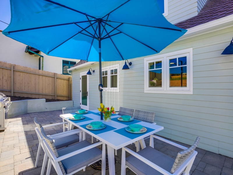 Back patio seating for outdoor entertaining.