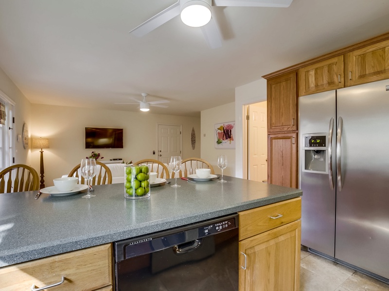 Kitchen opens up to the living room.