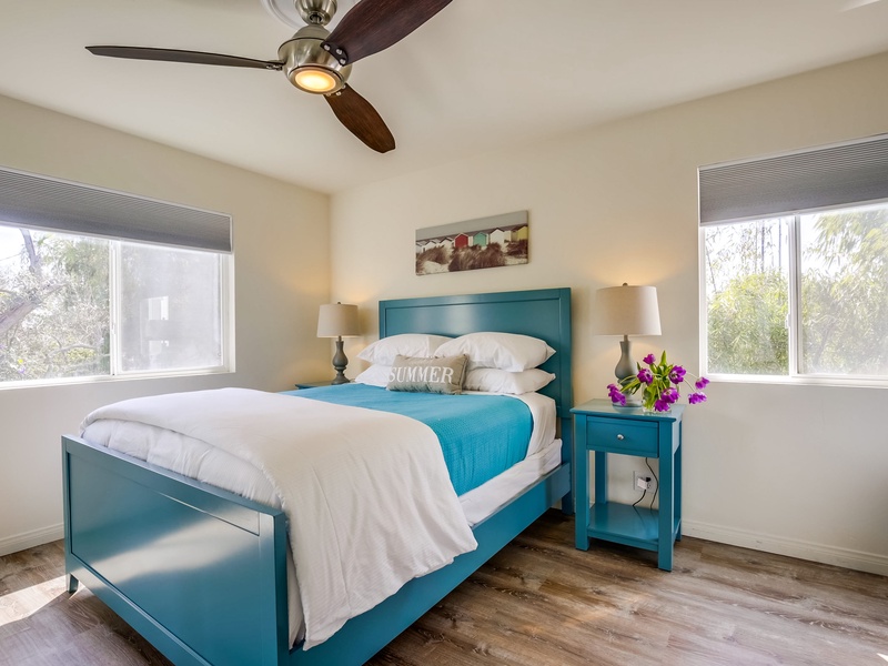 Second bedroom with queen bed, plus twin size bean bag bed.