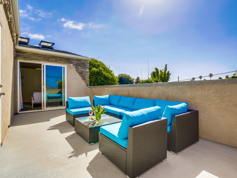Seating to enjoy the sun on balcony!