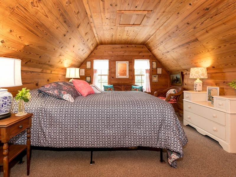 The master bedroom is upstairs and includes a terrific king bed