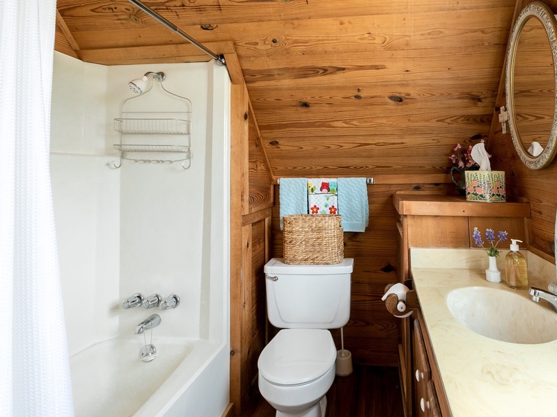Also upstairs is a full bathroom with a tub/shower