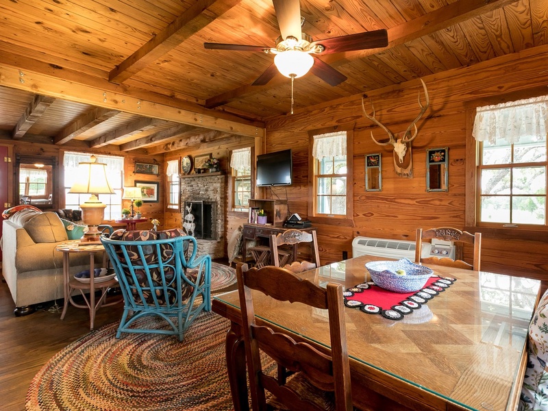 The living/dining area is a large and inviting space