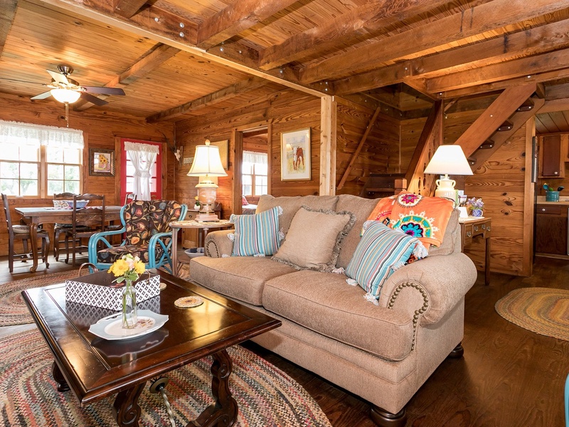 Relax on the sofa- perfectly situated in front of the fireplace