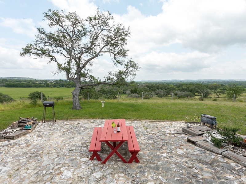 The large outdoor patio has a great view of the valley below