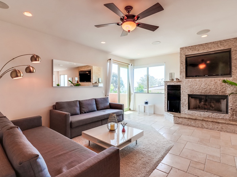Living room with 2 full size pull-out couches.