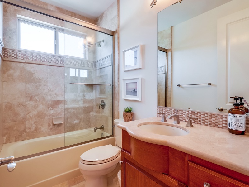 Second level bathroom in hallway.