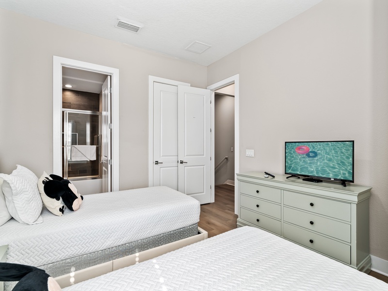 Each bedroom comes with its own closet, TV and bathroom.