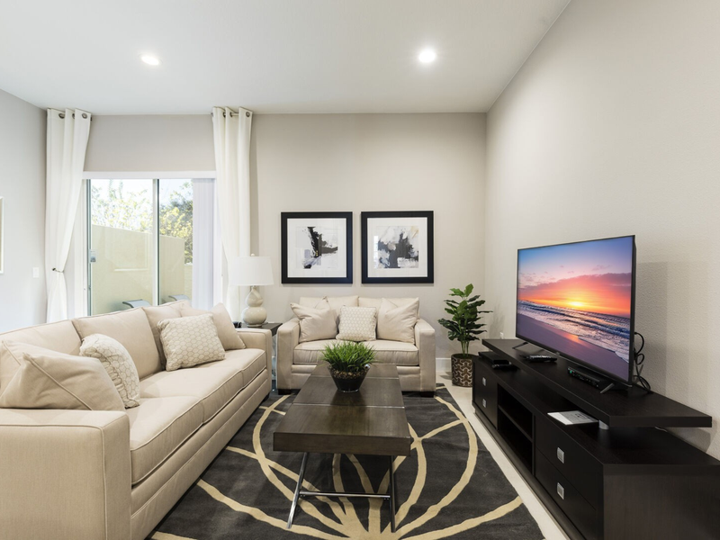 Kick back and relax with a movie night in our living area, featuring comfortable seating.