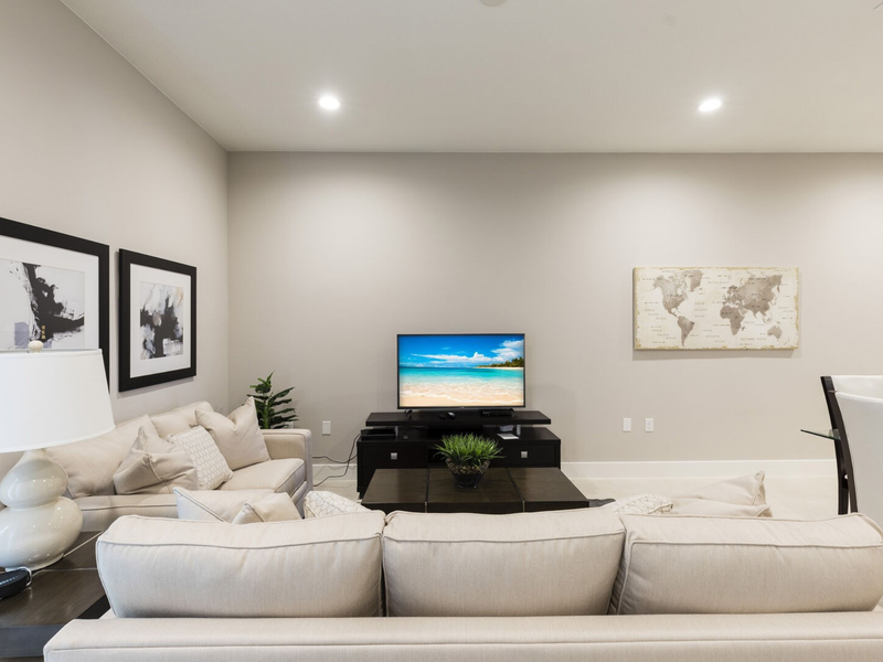 Kick back and relax with a movie night in our living area, featuring comfortable seating.