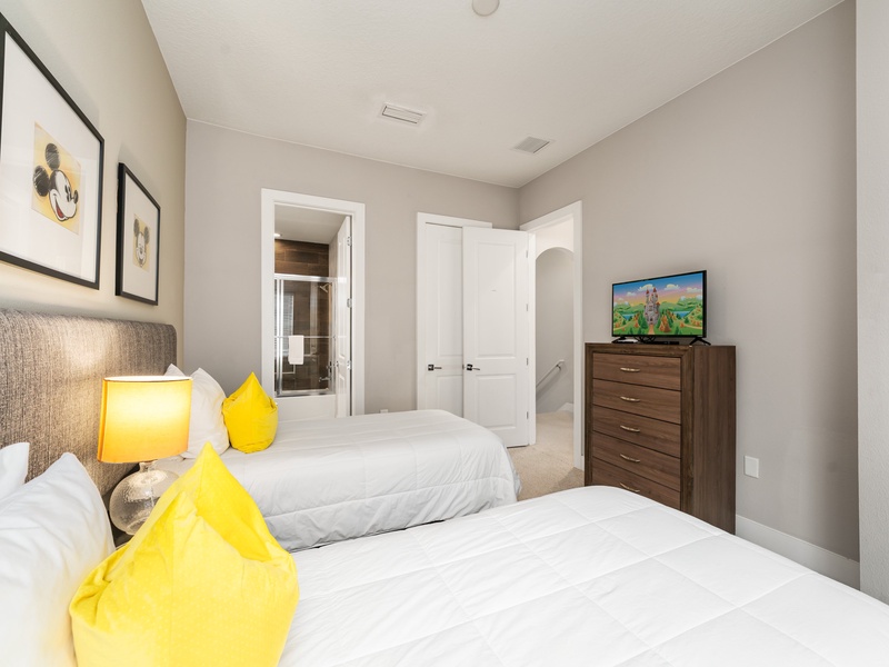 Each bedroom features its own TV and private ensuite bathroom.