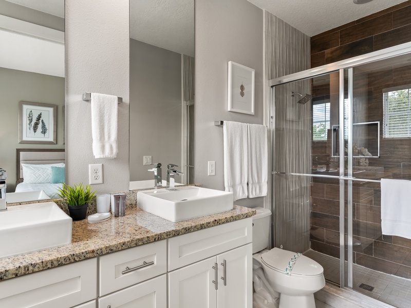 The master bathroom features both a walk-in shower and a soaking tub for your comfort and relaxation.