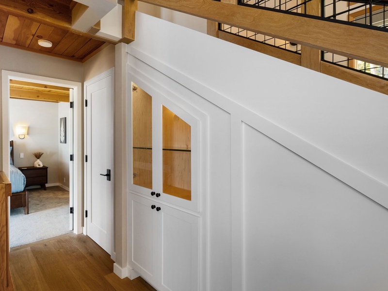 Enter the second suite bedroom from the main living area