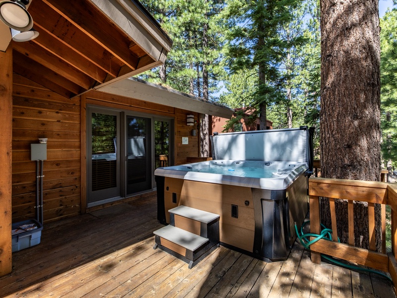 Private hot tub located just outside the primary bedroom