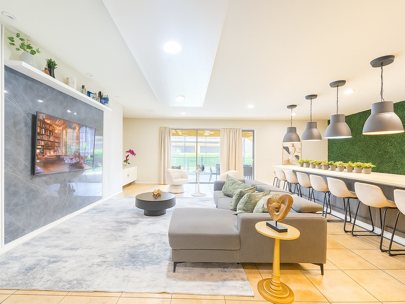 Enjoy a movie night in our cozy living room, complete with a large-screen TV and comfortable plush seating.