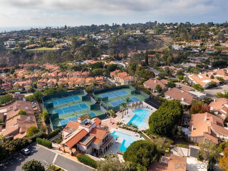 View of pool and tennis courts