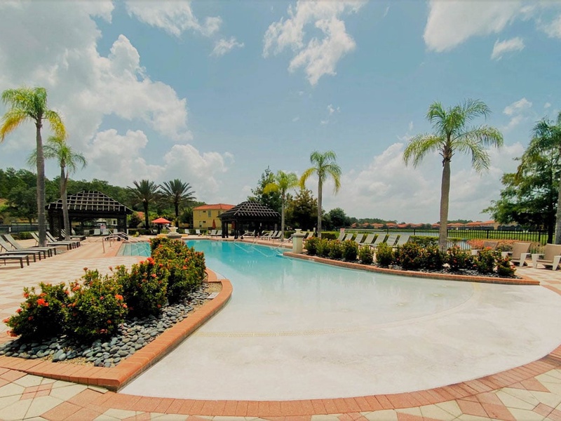 Enjoy the Florida weather and take a refreshing dip at the resort's expansive swimming pool.