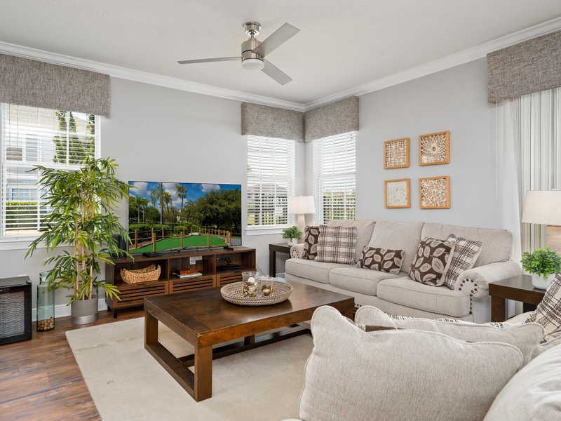 Enjoy ample seating, in the cozy living room, perfect for movie nights.