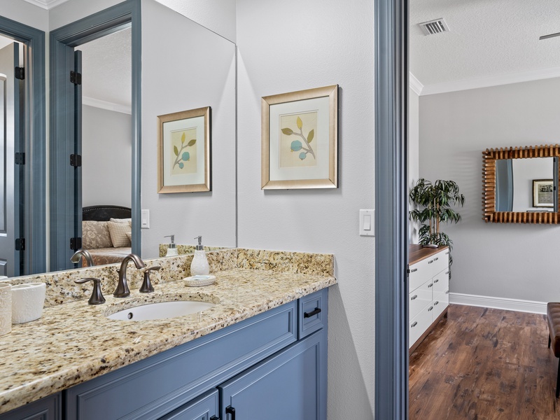 Shared bathroom with shower and bathtub.