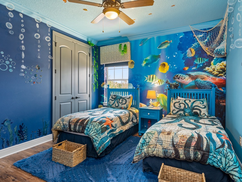 This charming guest room brings the sea to life with its tasteful sea-themed décor.