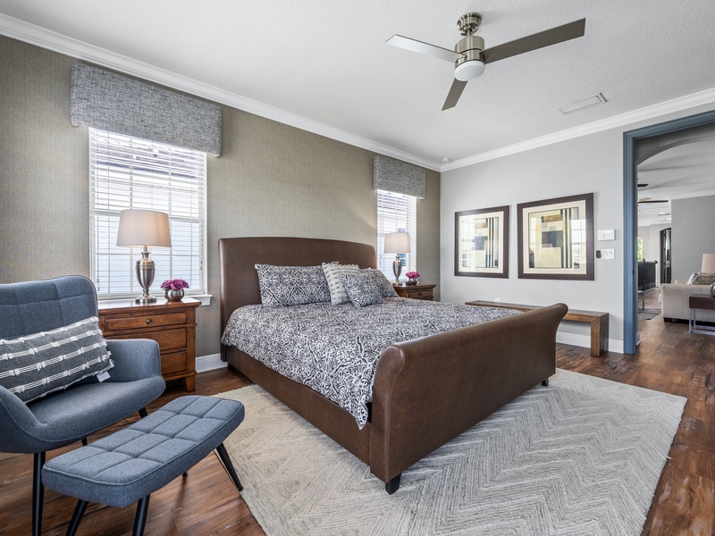 Beautiful spatious bedroom with full bathroom, TV and access to a private balcony.