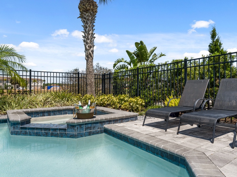 Relax by the pool in the comfortable lounge chairs.