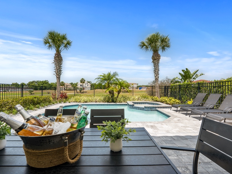 Relax and dine by the pool in style, with beautiful views and plenty of space for outdoor fun.