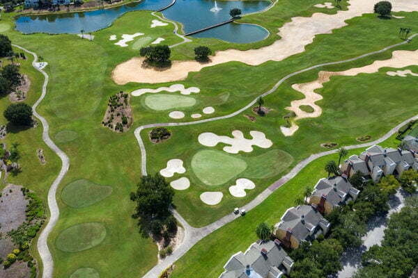 The golf course provides a scenic backdrop for your stay.