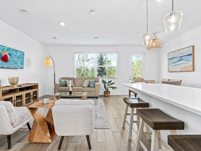 The villa features a modern, open-concept layout with plenty of natural light.
