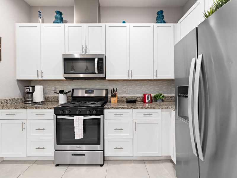 Kitchen includes stainless steel appliances and everything you need for meal prep.