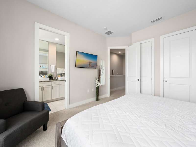 Our master bedroom is equipped with a TV and an ensuite bathroom for added comfort and privacy.