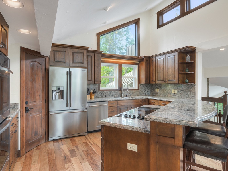 Chef's kitchen with plenty of built-in and small appliances