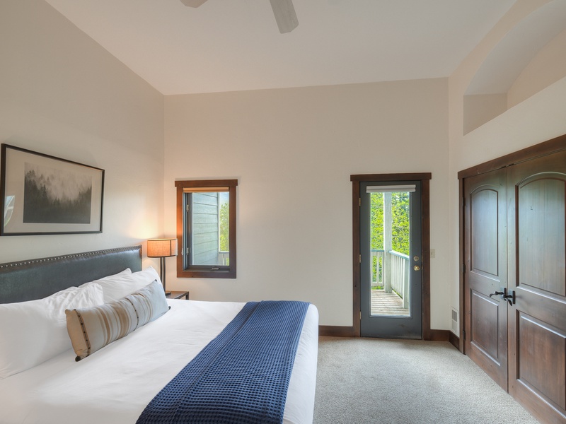 Second Bedroom (Level 3): King bed; private balcony.