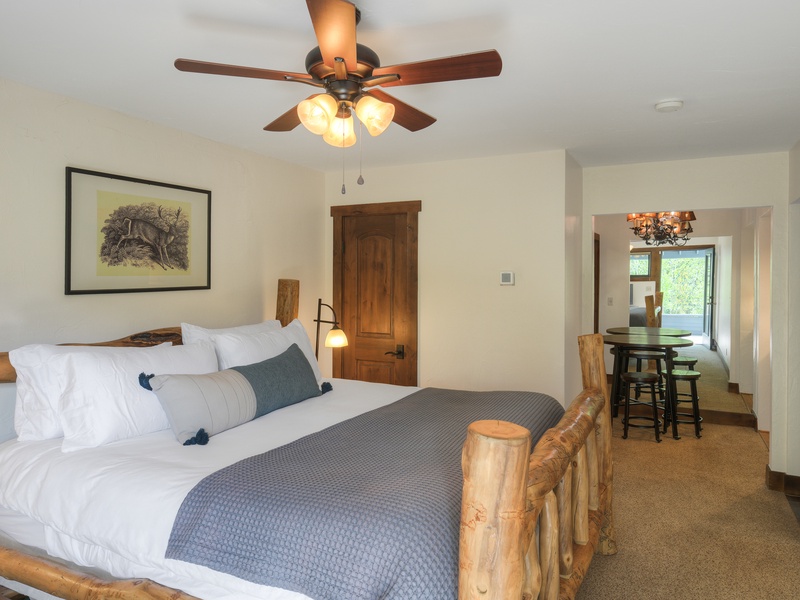 Fourth Bedroom (Level 2): King bed, (shared) terrace access, kitchenette with microwave, coffee maker and minifridge, and ensuite bath with shower and toilet.