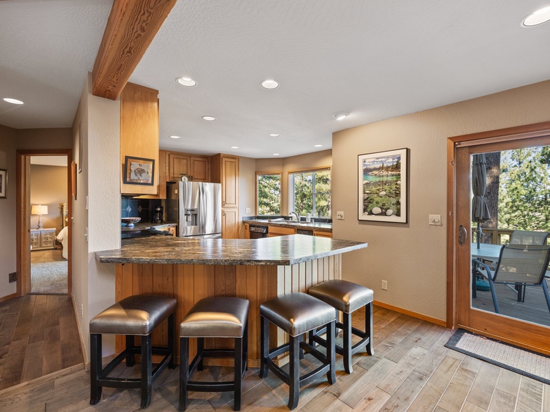 Seats four at the breakfast bar, great for extra dining space