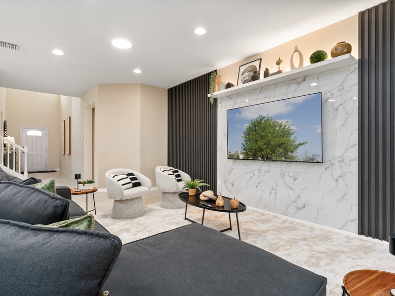 Enjoy cozy movie nights with family and friends in spacious, plush seating.