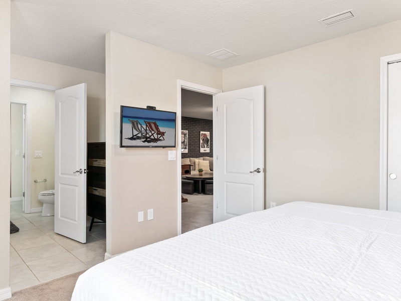This bedroom comes with its own TV, closet space and semi private bathroom.