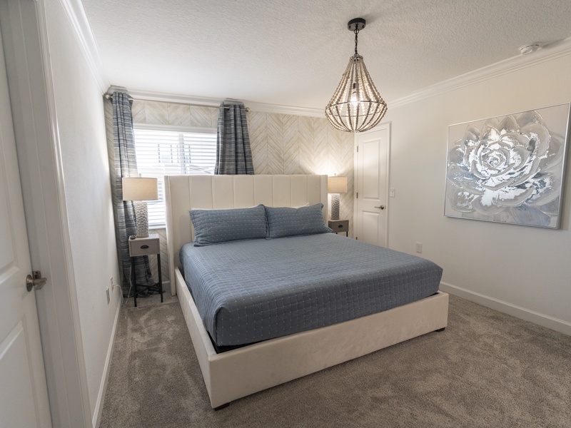 This bedrooms features its own private bathroom.